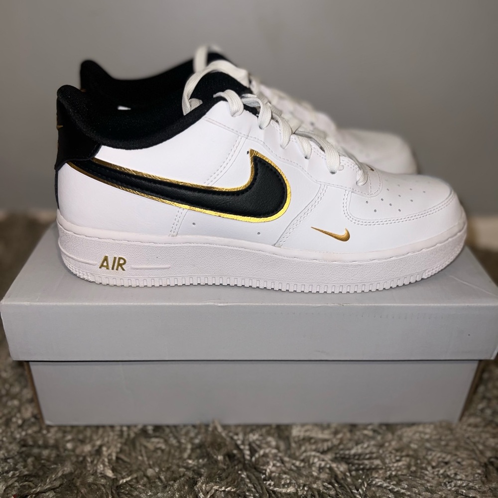 Nike Air Force 1 White with Black and Metallic Gold Accents